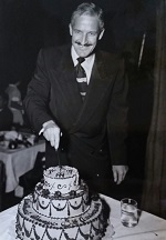 1949 - Ted Mitchell, SWA, cutting 3rd Anniversary Cake 