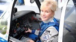Captain Ernie Clark's daughter, Julie Clark, and her Beechcraft T34A Mentor